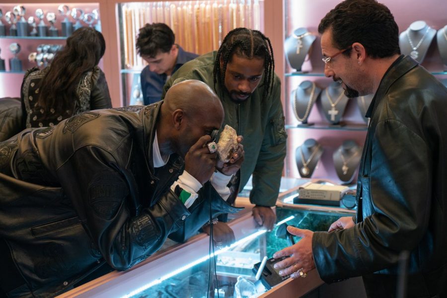 Kevin Garnett, Lakeith Stanfield, and Adam Sandler (left to right) in the Safdie Brothers film Uncut Gems, now playing at the Living Room Theaters at FAU. Photo courtesy of IMDB.