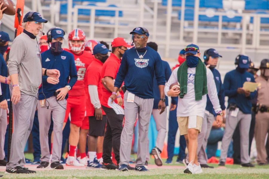 Willie Taggart (pictured blue in middle) made changes in his coaching staff for the 2021 season. Photo by Alex Liscio.