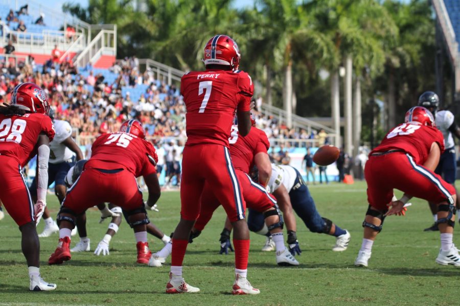 NKosi Perry (#7) prepares for the snap in the Shula Bowl against FIU on Oct. 2, 2021.