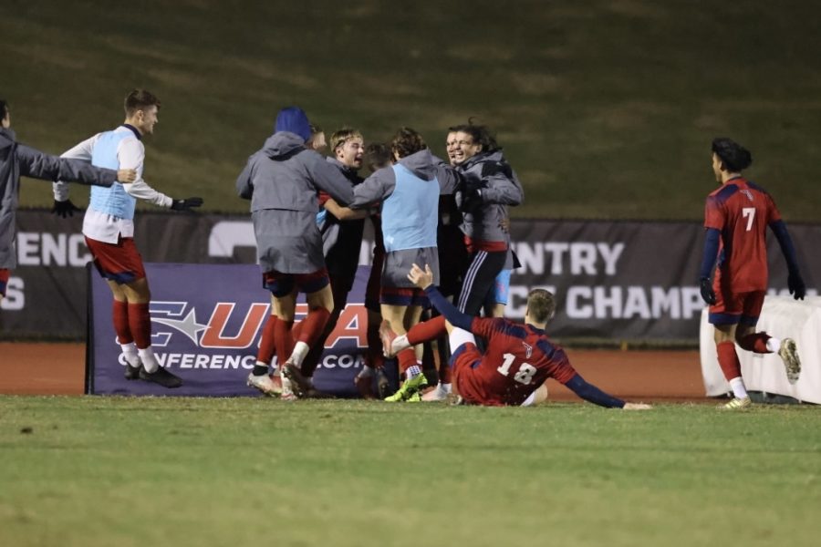 FAU mens soccer celebrate as the team clinches their spot in the C-USA Championship game after beating Marshall 3-1 on Nov. 12, 2021. Photo courtesy of FAU Athletics.