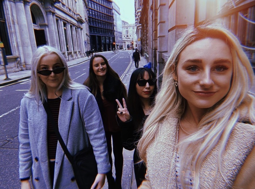 Kizzy and friends walking through Covent Garden, London, England. Photo by Kizzy Azcarate.