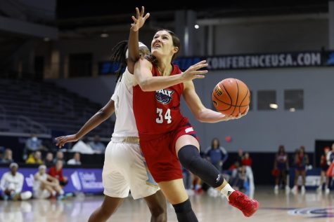 Alexa Zaph (#34) drives into the paint to take a shot against FIU on March 8, 2022.