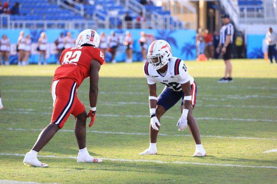 Jayden Williams (#22, right) lines up against JeQuan Burton (#82, left) during the 2022 Spring Game on April 9, 2022.