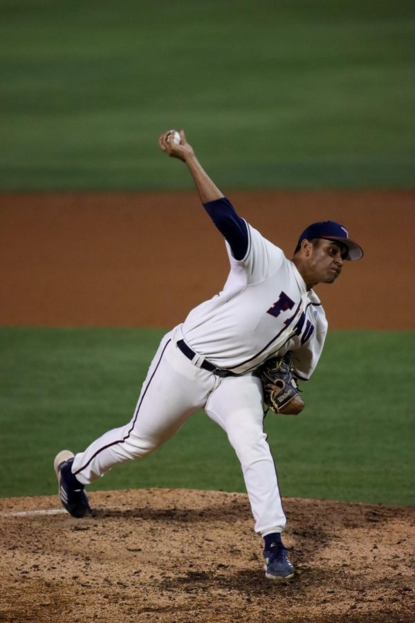 Nicholas Del Prado in action against UCF on April 5, 2022. He pitched for one full inning and only allowed one hit.