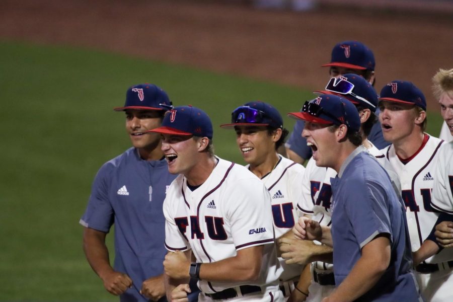 FAU players celebrate Nolan Schanuels late homerun against UCF on April 5, 2022. Schanuels blast gave the Owls the lead for the remainder of the game. 