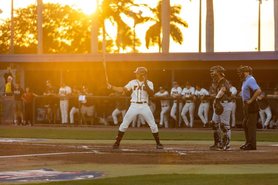 Gabriel Rincones Jr. lines up at the plate as the sun sets on April 5, 2022.