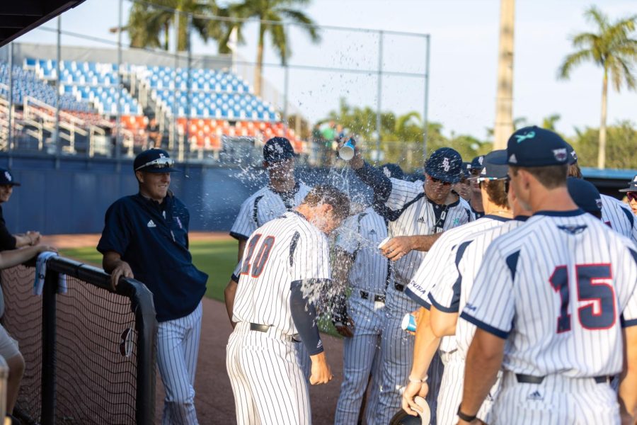Photo+of+FAUs+baseball+team+celebrating+in+the+dugout+on+Friday%2C+April+8+by+pouring+water+on+%2310+freshman+catcher+John+Schroeder.