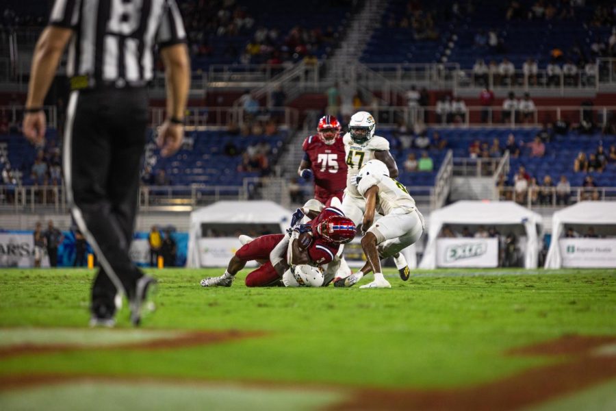 Larry McCammon III goes down after a tackle from Southeastern Louisiana on Sep. 10, 2022.