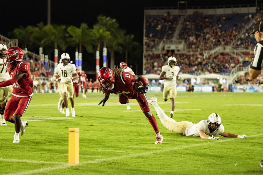 Dwight Toombs II trips from UCF tackle on his way to the end zone during the third quarter on Sep. 10, 2022
