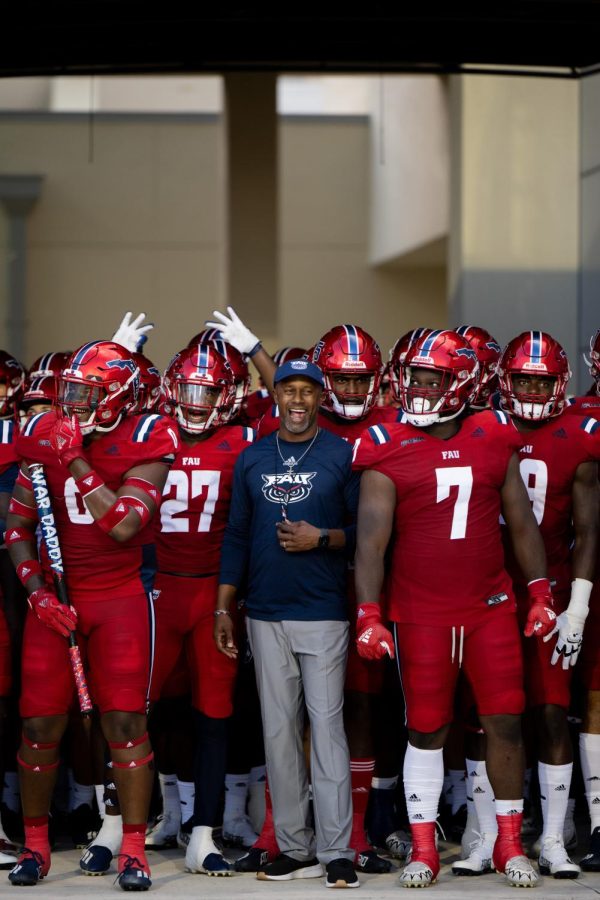 Head Coach Willie Taggart holds front and center as the Owls wait for their grand entrance for the 2022 opening game on August 27 against Charlotte.