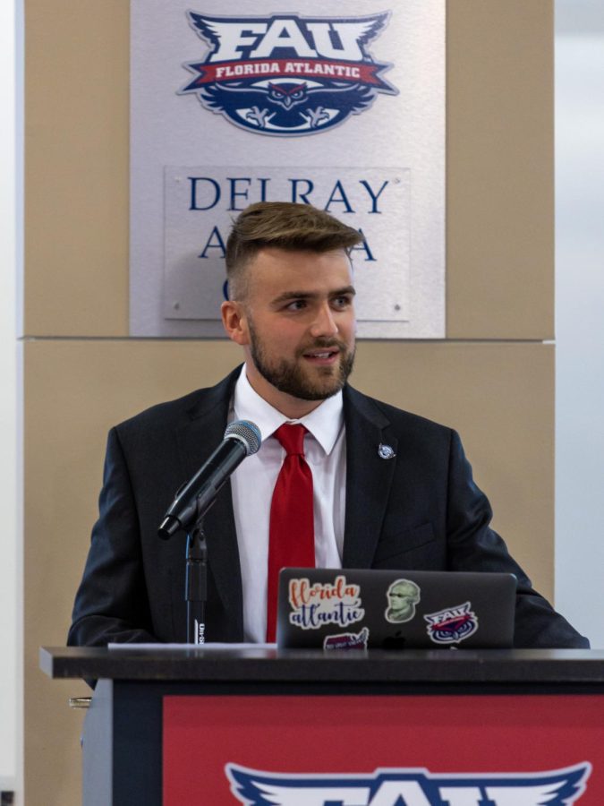Student+Body+President+Pierce+Kennamer+addresses+the+FAU+community+at+the+podium+during+the+University-Wide+Address+in+the+Delray+Acura+Club+at+FAU+Stadium+on+Aug.+31%2C+2022.