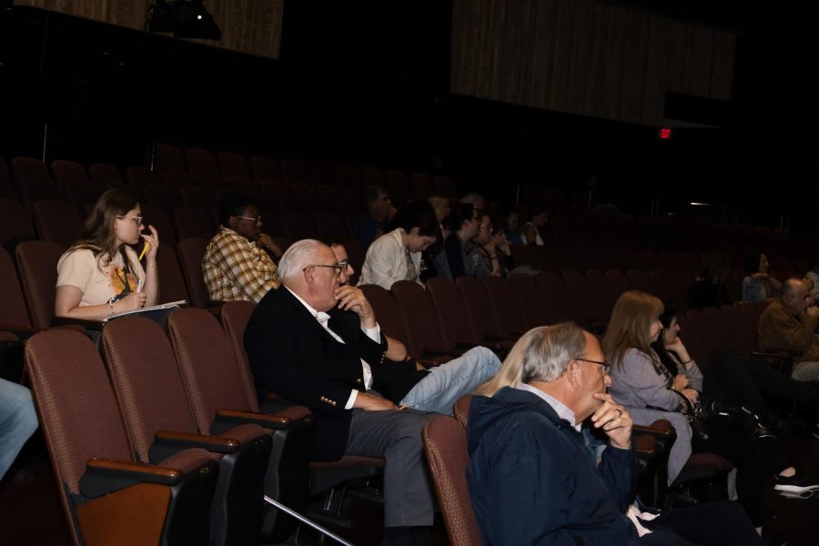 Audience members during the video a mans experience being raised in Nazi Germany.