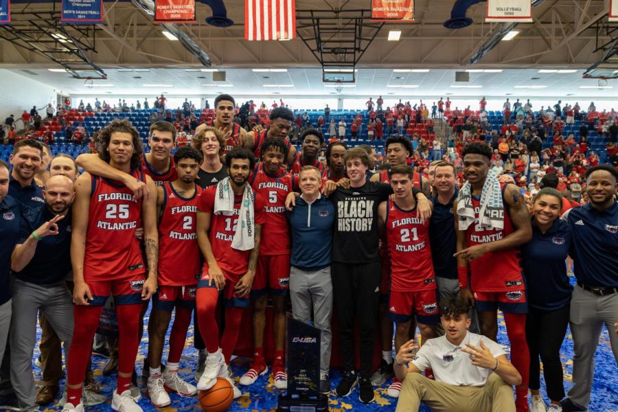 Head+coach+Dusty+May+and+the+FAU+mens+basketball+team+after+wining+the+C-USA+regular+season+championship+on+Feb.+25%2C+2023.
