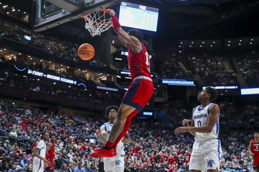 Sophomore guard Alijah Martin throwing down a dunk against Memphis in the first round of the NCAA Tournament on March 17, 2023.