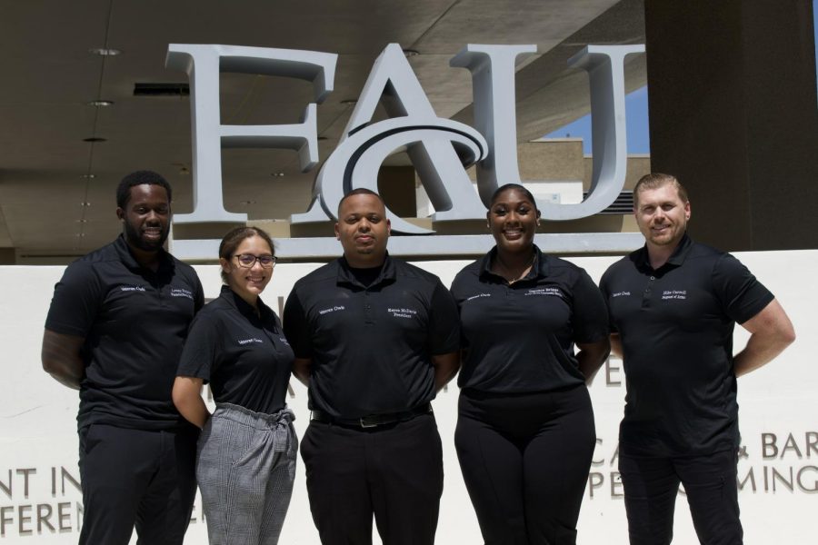 Left to right: Veteran Owls Clubs Lenine Dolidor, Natalie Noesi, Keyon McDavis, Deyonce Briggs and Michael Carroll in front of the Student Union.