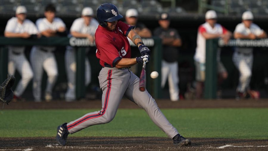 Jackson Ross (#15) swinging at-bat in FAUs loss to Western Kentucky.