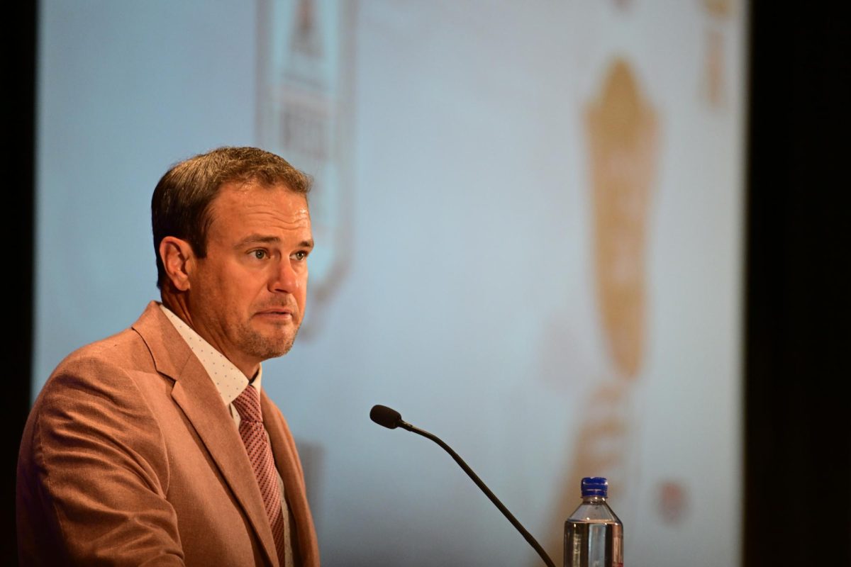 Photo of Head Football Coach Tom Herman speaking at the American Athletic Conference Media Day at Irving, Texas on Tuesday.