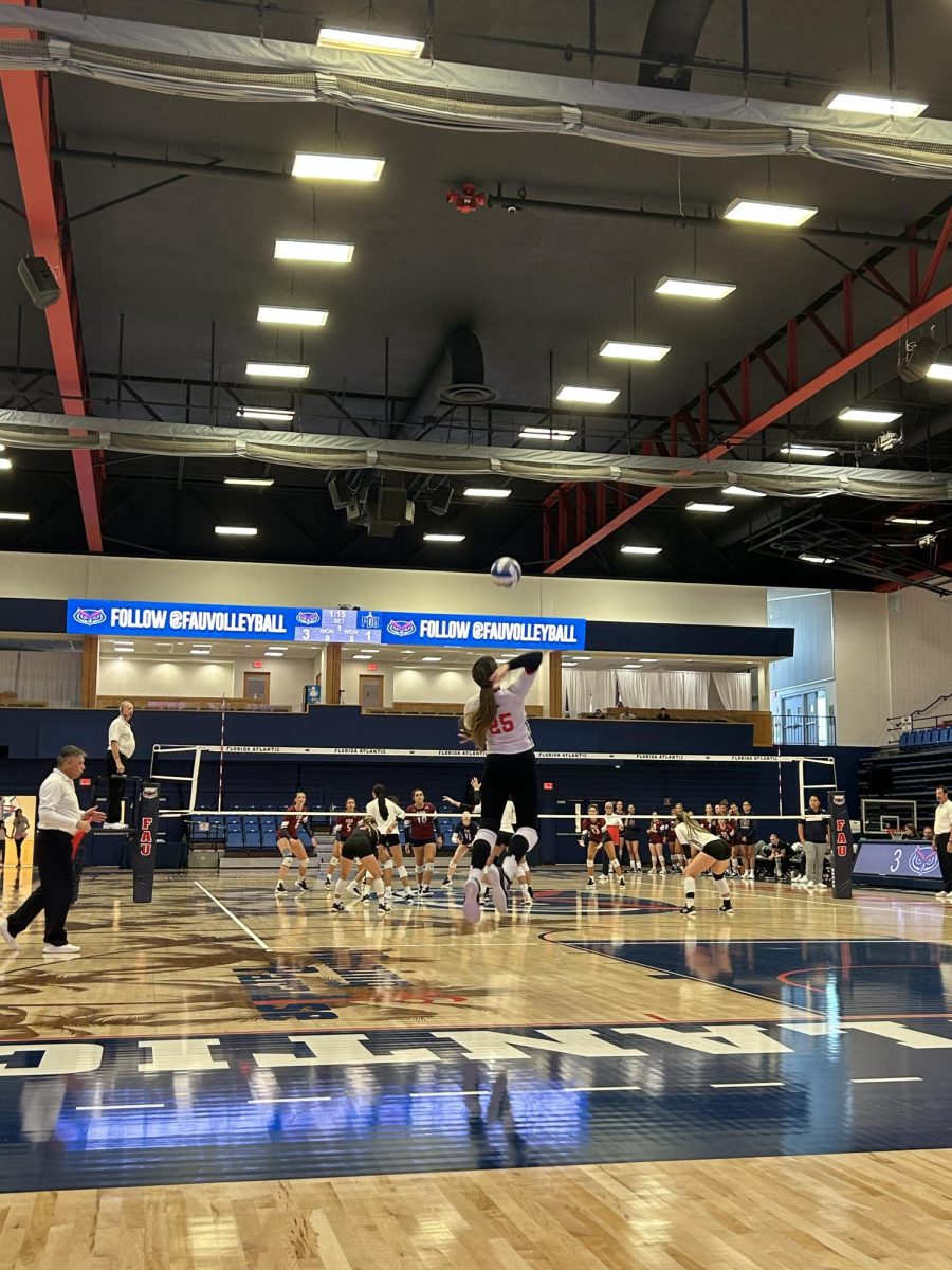 FAU outside hitter Romina Cornelio (#25) in the middle of a serve during the Owls win over the FDU Knights. August 26, 2023.