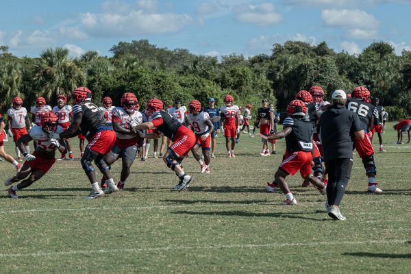 The Owls defensive line (white) facing off against the offensive line (black), who are posing as the Bobcats, at practice ahead of Saturdays home game. September 6, 2023.