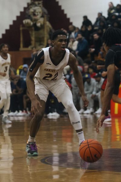 Devin Vanterpool stares down his opponent against Archbishop Stepinac High School on January 22, 2023.