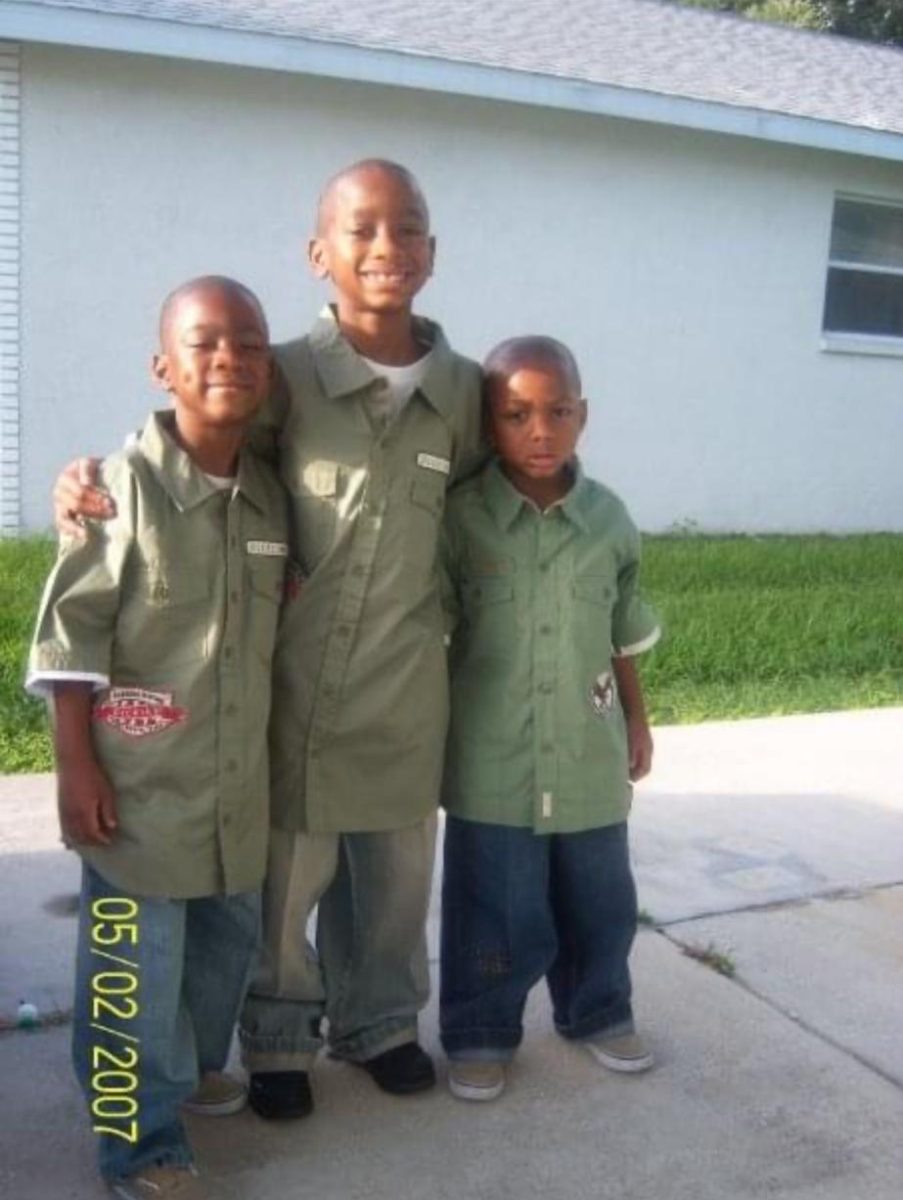 (From left to right) LaJohntay, John and Jaylen in their childhood home in 2007.