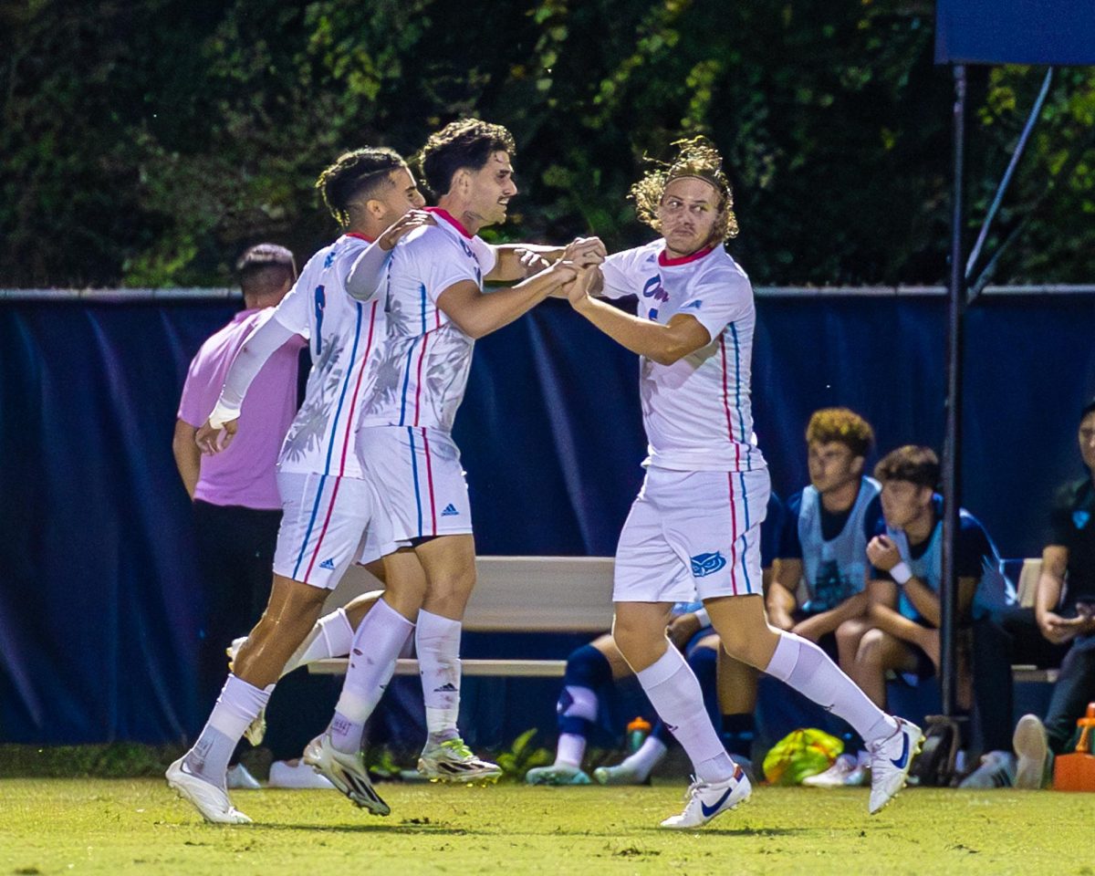 FAU junior defender Chadi Mayati (left) and junior midfielder Leo Keller (right) celebrating graduate forward Victor Claudel (middle) after Claudels goal early in the first half of the Owls 2-1 victory over the Florida International University Panthers on Friday, Oct. 20, 2023.