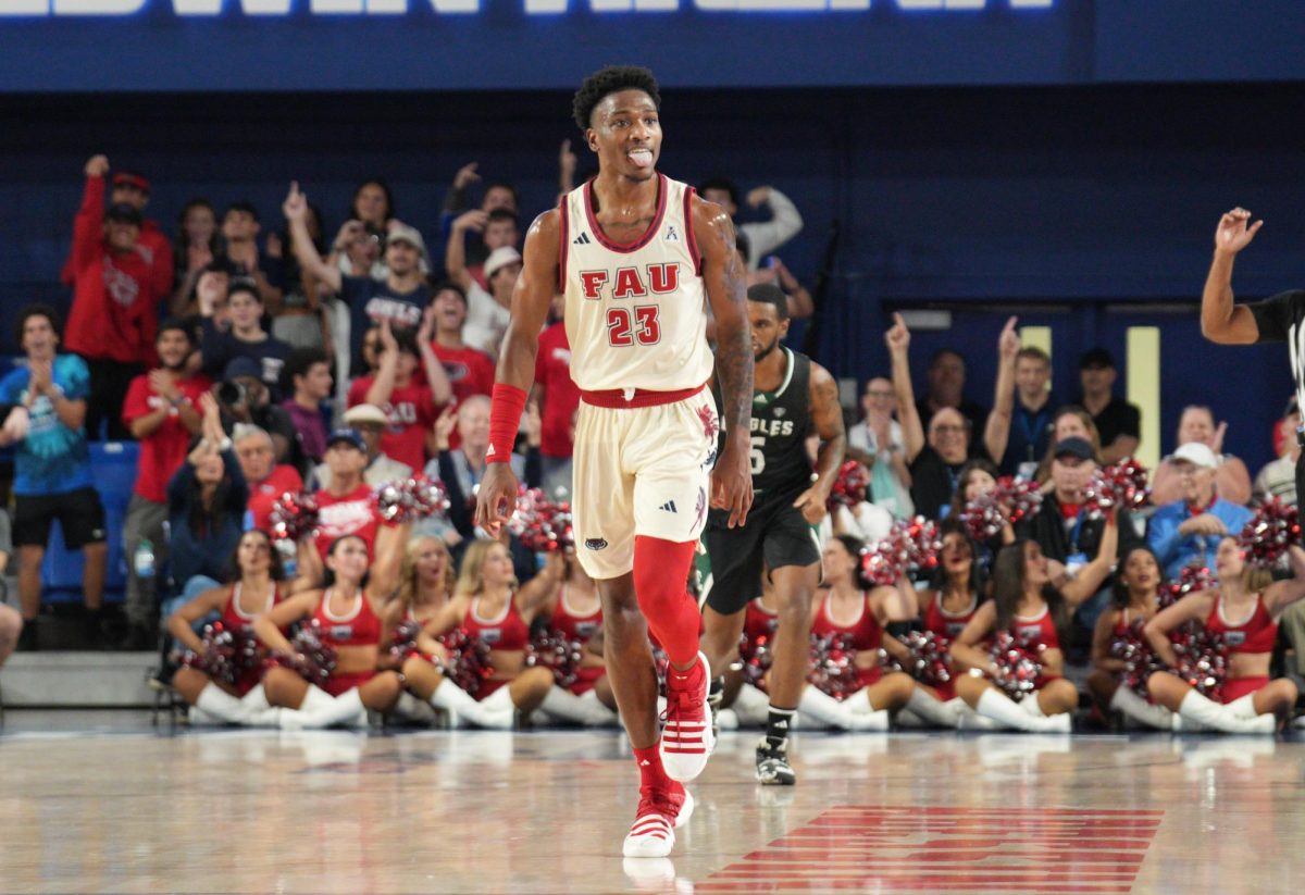 FAU senior guard Brandon Weatherspoon celebrating a three-point shot during the Owls 100-57 home win against Eastern Michigan. Weatherspoon ended the game with 16-points and four rebounds.