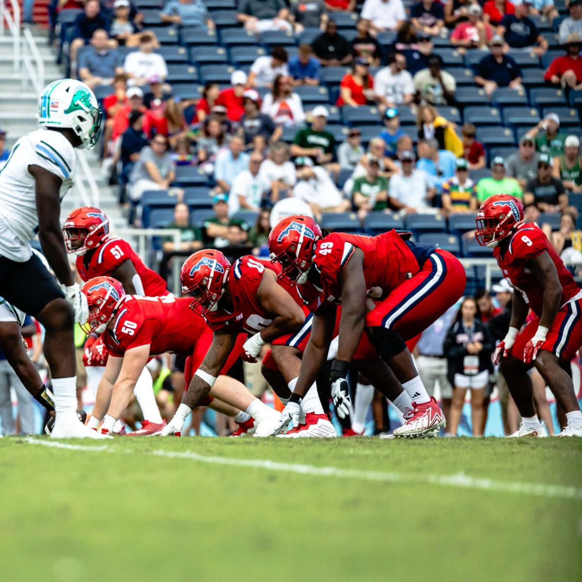 The+FAU+defense+getting+set+for+a+third+down+against+the+Tulane+offense+during+the+Owls+24-8+loss+in+their+home+finale+on+Saturday%2C+Nov.+18%2C+2023.