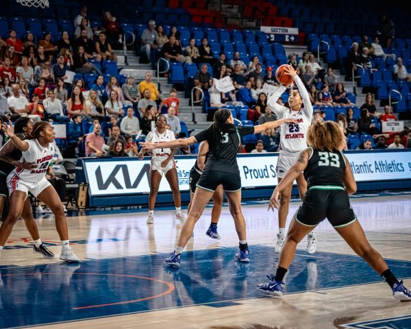FAU senior guard Jada Moore (#23) shooting over a Stetson defender during FAUs 50-39 win on Monday, Nov. 21, 2023. Moores 16 points, six rebounds, and three assists aided the Owls during their 19-point comeback over the Hatters.
