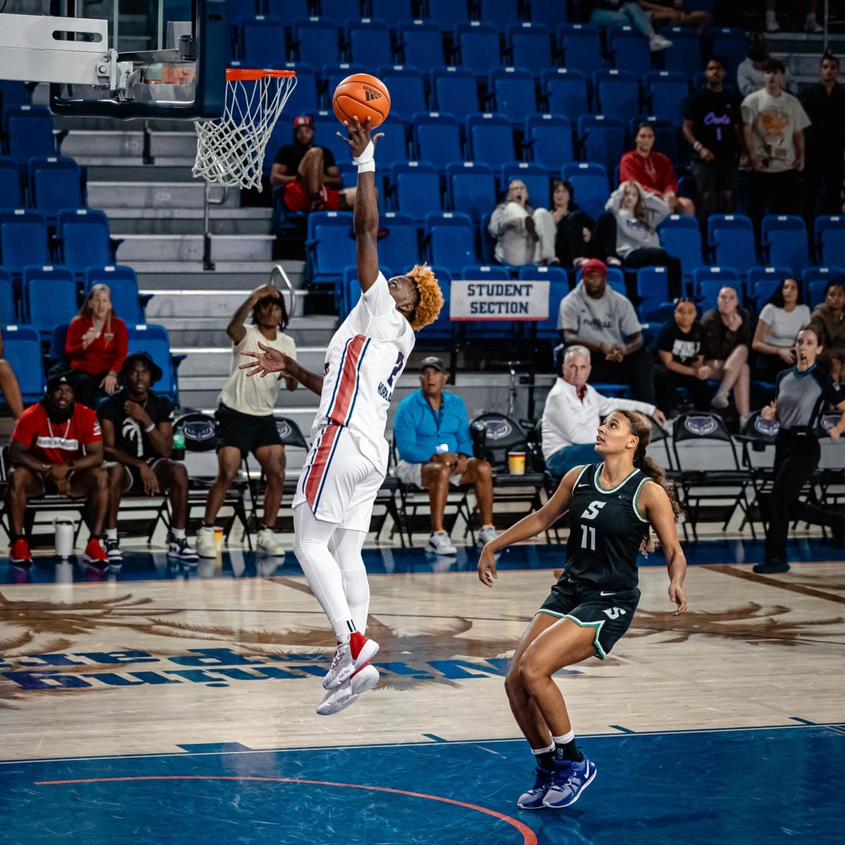 FAU+sophomore+guard+Aniya+Hubbard+%28%232%29+goes+up+for+the+layup+in+the+last+minutes+against+Stetson+during+the+Owls+50-39+comeback+home+win+on+Monday%2C+Nov.+20%2C+2023.