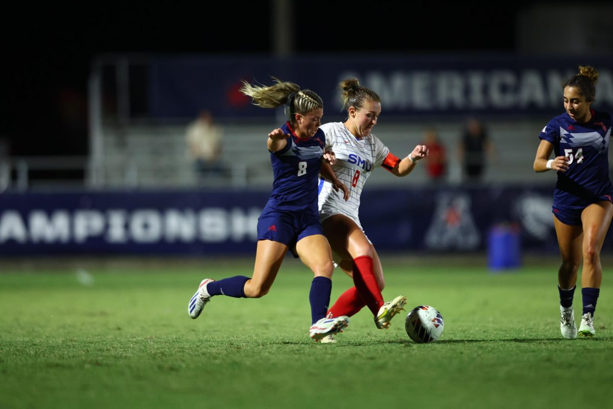 FAU+junior+forward+Drew+Dempsey+%28%238%29+and+SMU+senior+midfielder+Mackenzie+Rudden+%28%238%29+fighting+for+the+ball+during+the+Owls+3-0+loss+to+the+Mustangs+in+the+semifinals+of+the+AAC+Womens+Soccer+Tournament+on+Thursday%2C+Nov.+2%2C+2023.