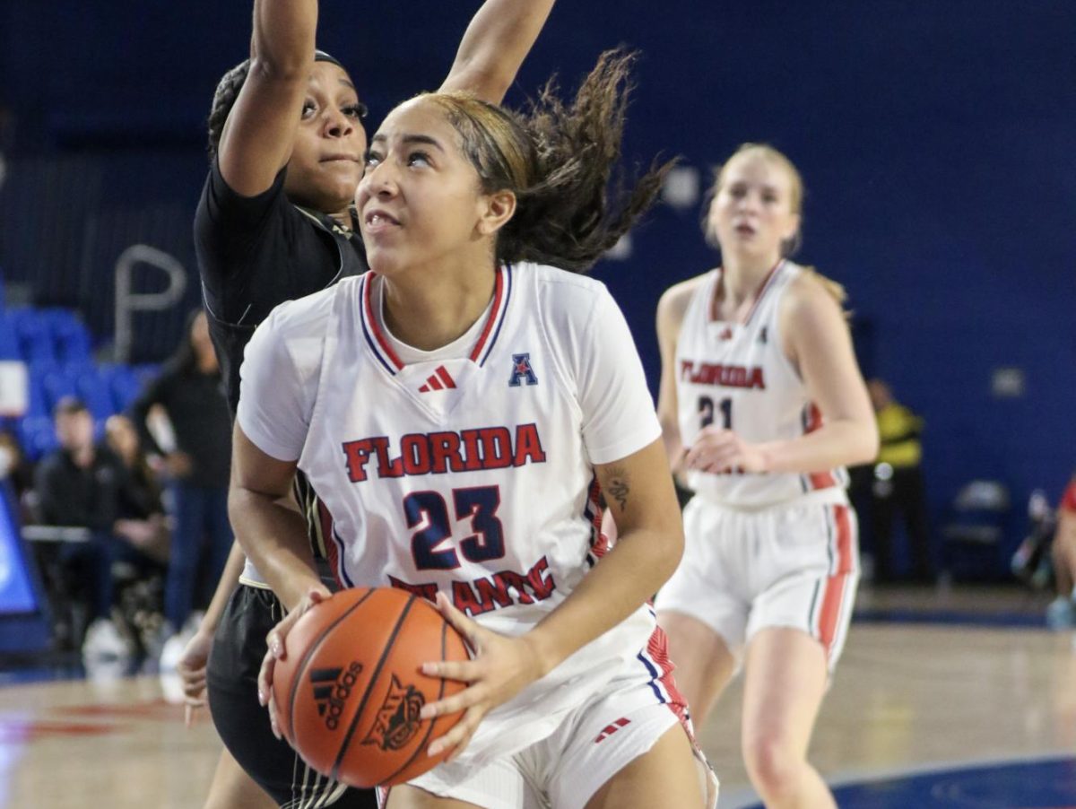 FAU+senior+guard+Jada+Moore+in+the+post+going+for+a+layup+against+a+UAB+defender+during+the+Owls+65-53+home+loss+on+Saturday%2C+Dec.+30%2C+2023.