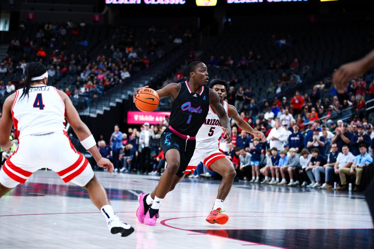 Junior guard Johnell Davis (#1) led the Owls to their first double overtime game and first double overtime win against No. 4 Arizona on Saturday, Dec. 23, 2023 in Las Vegas.  Arizona was the highest ranked team FAU has faced in program history and FAU highest ranked win.