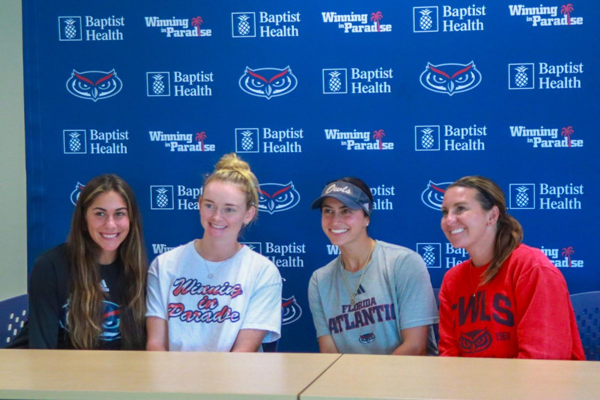 (From left to right) Junior pitcher Gabby Sacco, grad. student outfielder Kamryn Jackson, senior outfielder Cammeo Presutti, and head coach Jordan Clark at 2024 FAU Softball Media Day