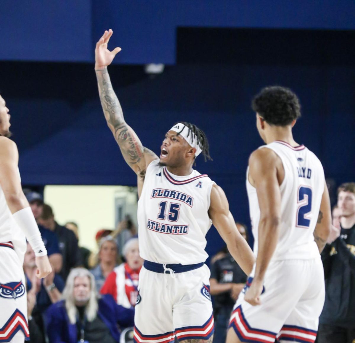 Alijah+Martin+hyping+up+the+FAU+Student+Section+during+the+teams+86-77+comeback+win+against+Wichita+St.+