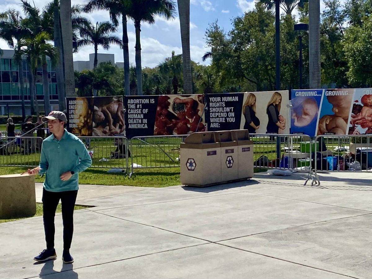 Anti-abortion protesters hold rally on campus, eliciting mixed reactions from students
