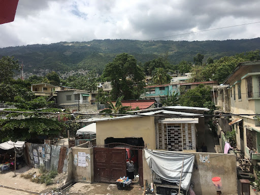 Saint Vil shares a photo of her family’s old neighborhood where her childhood home once stood, located in Carrefour Feuilles in Port Au Prince, Haiti.