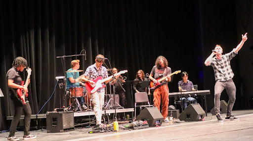 Jacob Kahn gets into the rhythm of the beat performing his original song “Individual” with his band on April 6.