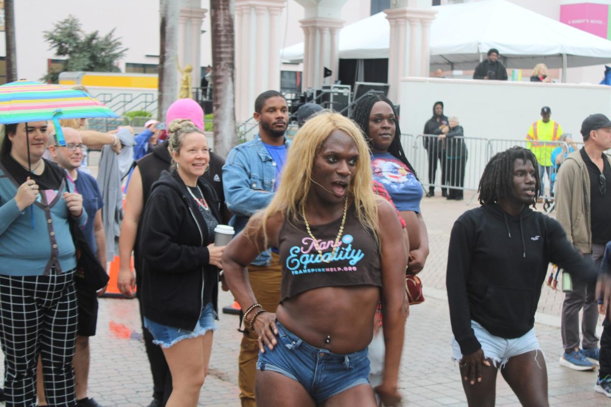 A community member dancing at the Martin Luther King Jr. Unity March in Boca Raton's Mizner park. 