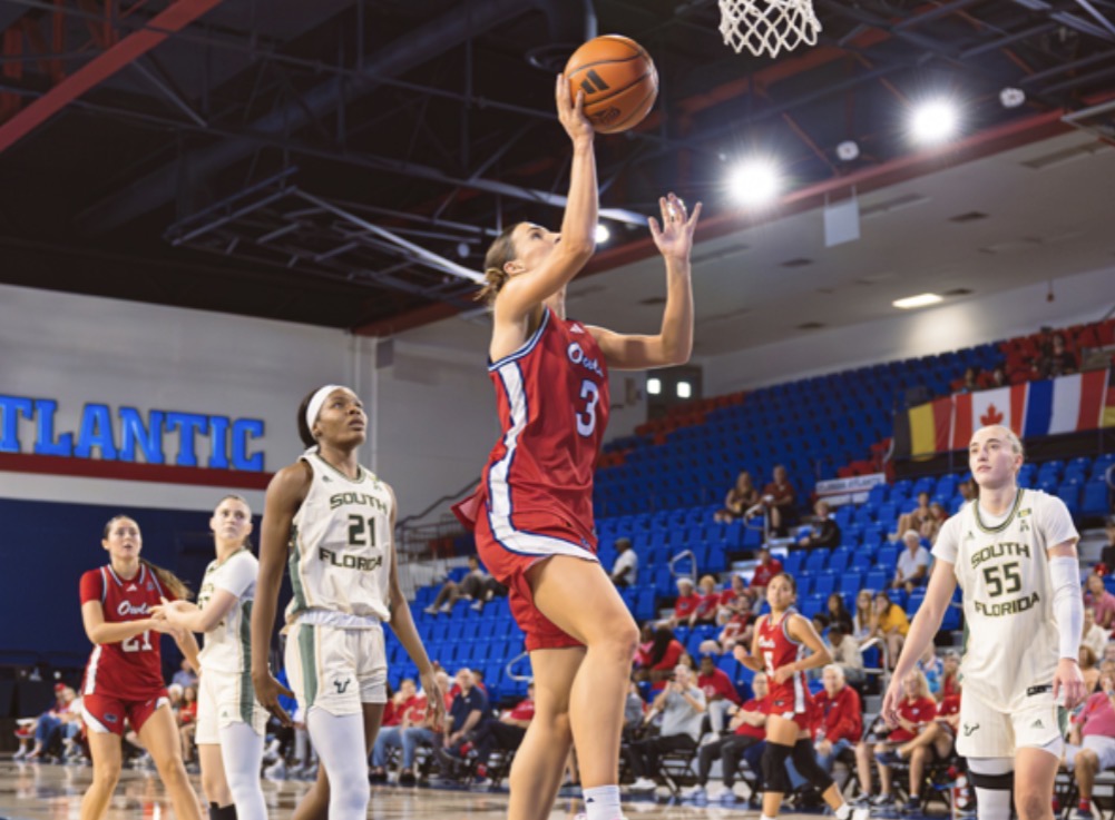 FAU guard Jess Moors shoots the ball in FAU’s game against the University of South Florida on Saturday, Jan. 23, at the Eleanor R. Baldwin Arena