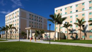 A photo of the east entrance of Glades Park Towers on the Boca Raton Campus, Courtesy of the FAU Housing and Residential Education website