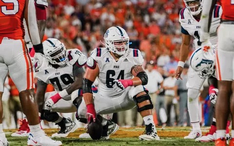 Federico Maranges, No. 64, gets ready to snap the ball during an FAU football game at Flagler Credit Union Stadium. 
