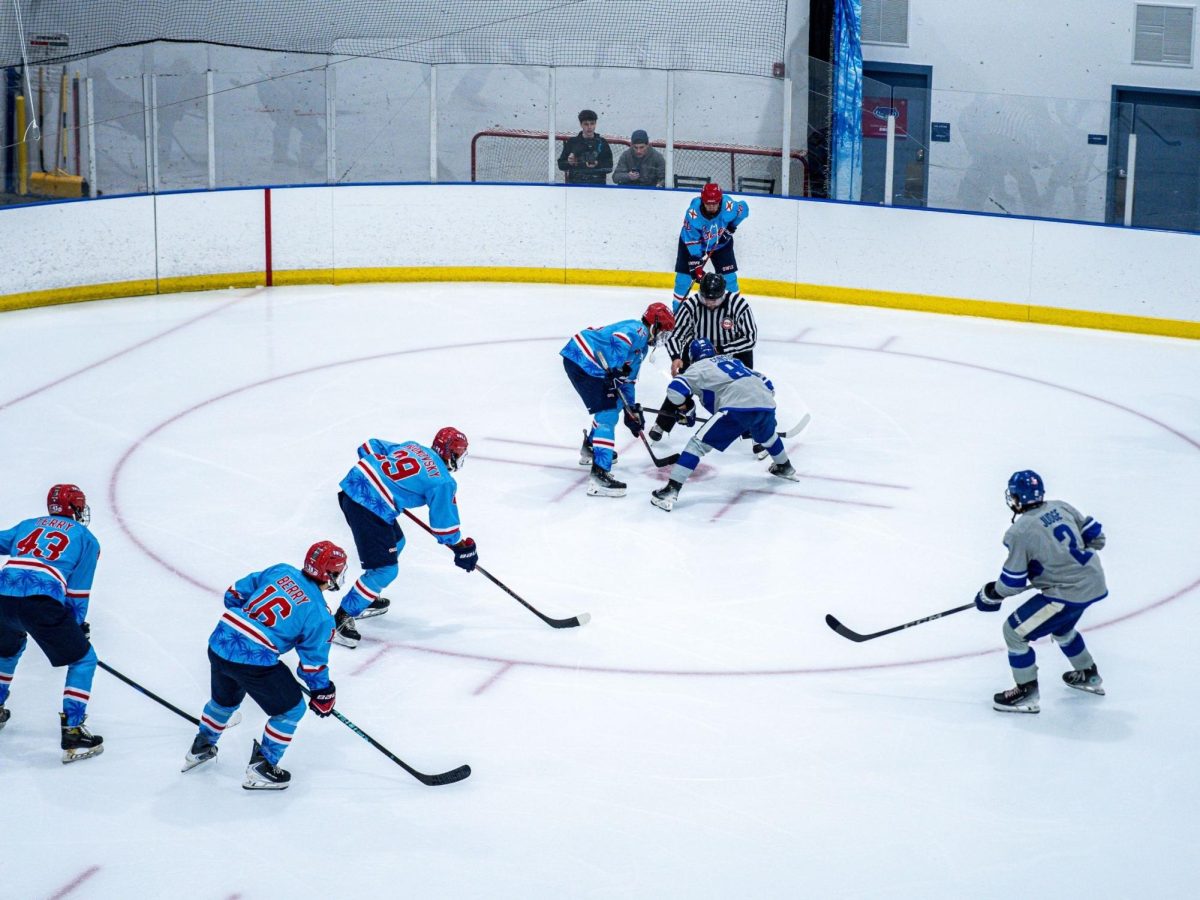 FAU and Lynn wait for the face-off during their intense game on February 13 at Boca Ice. Fau went on to lose the game 8-1. 