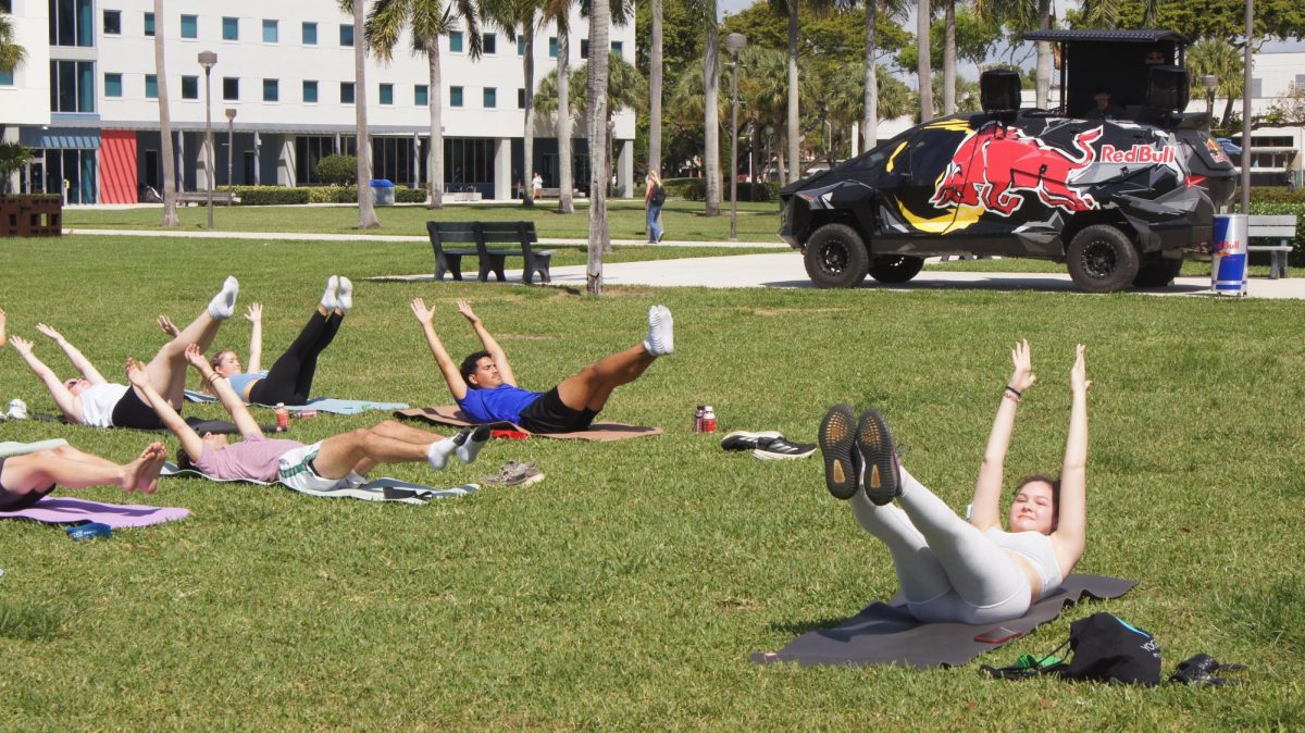 Students lined up on the housing lawn of FAU’s Boca Raton campus to participate in a FITT Pilates workout on March 27.