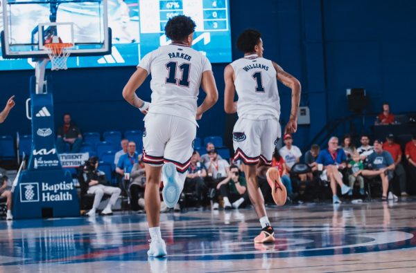 (left to right) FAU players Josiah Parker & Devin Williams run back on defense after a made basket during FAU’s 76-75 win against the Charlotte 49ers on March 2, 2025 at Eleanor R. Baldwin Area.