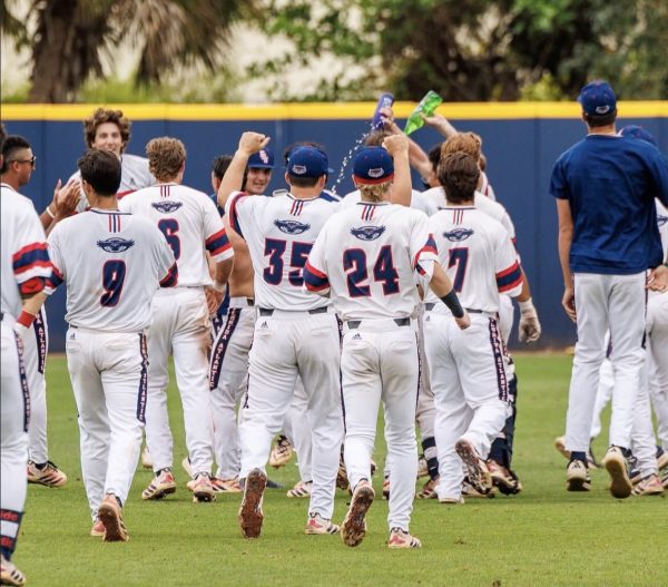 The FAU Baseball team celebrates a walk-off 4-3 win against UMBC at FAU Baseball Stadium.