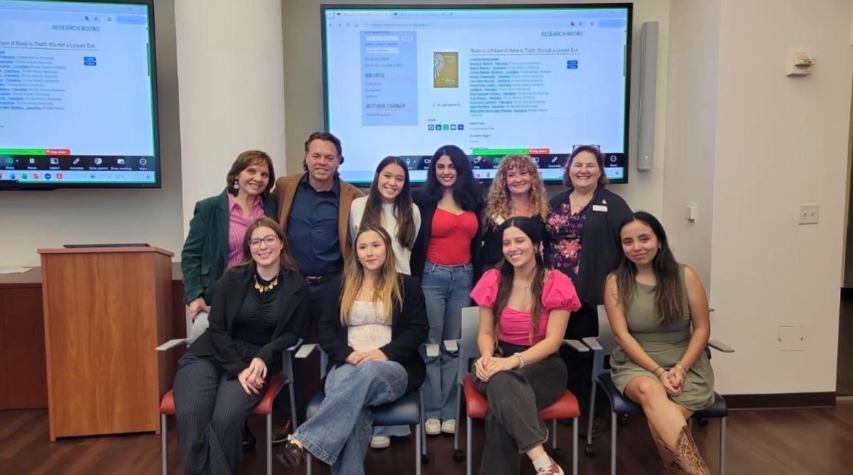 Photo of the translation team at publication ceremony for first translated piece (from left to right), top row: Teresa Oteiza, Andres Ramirez, Cleo Miyake, Sofia Gallo Gutierrez, Angela Nichols, Victoria Thur; bottom row: Salome Diaz, Gabriela Quintero, Lina Sofia Vasquez, Aura Cuasquer Ordonez. Courtesy of Angela Nichols. 