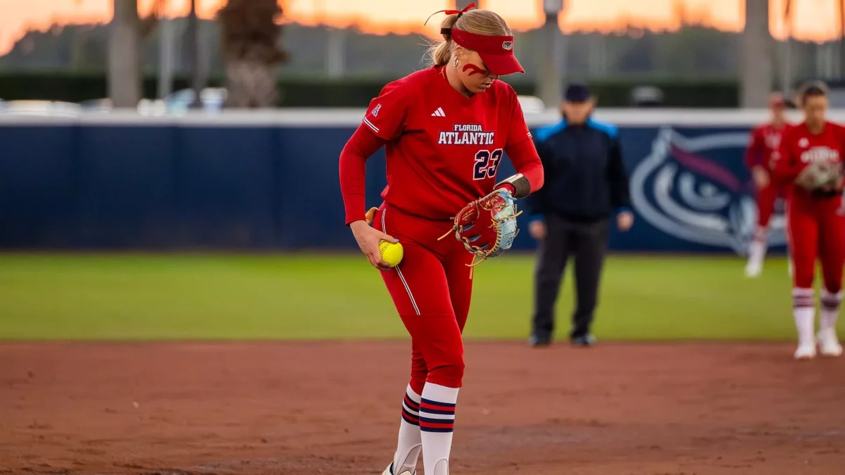 FAU pitcher Autumn Cortney at the mound, preparing to enter her throwing motion, in a loss to South Florida. 
