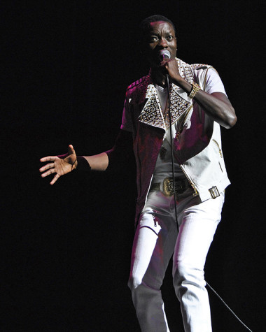 African King of Comedy and headliner of the night, Michael Blackson,
kept on a serious face as he threw jokes out to the audience who
hopped in their seats from hysterical laughter. Photo by Melissa.
