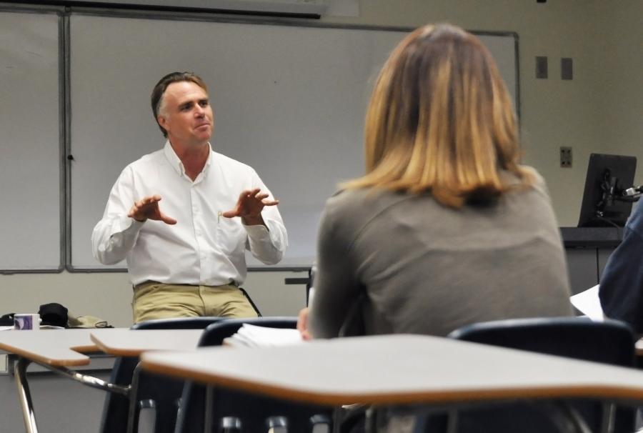 James Tracy introduces himself in his first class of the semester following the media coverage of his blog posts about the Newtown shooting. Photo by Michelle Friswell